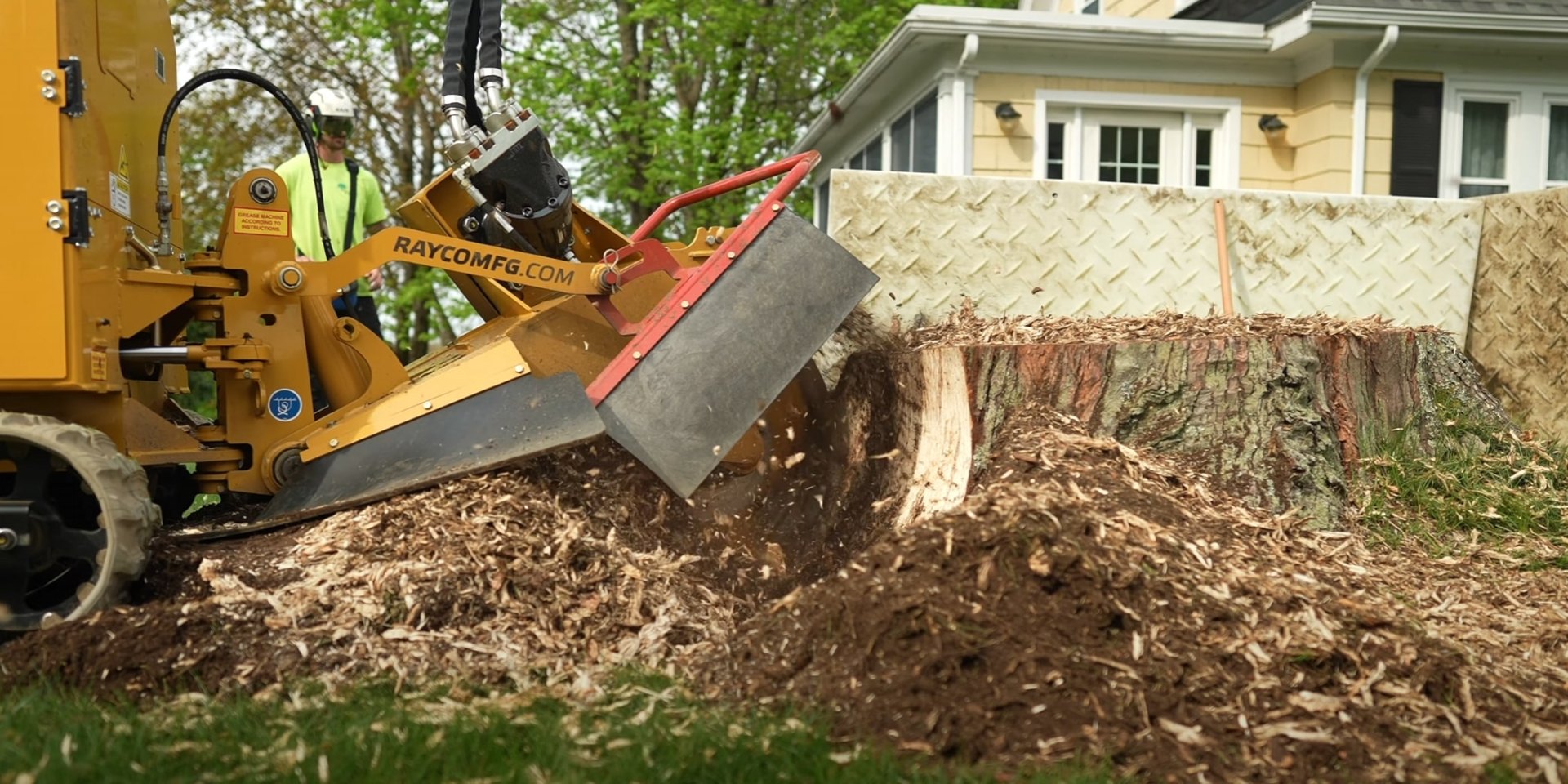 Stump Grinding Services Professional stump grinding equipment in action